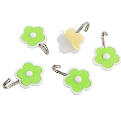 a bunch of green and yellow flowers on a table 