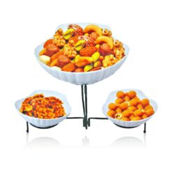 a bowl of oranges sitting on top of a table 