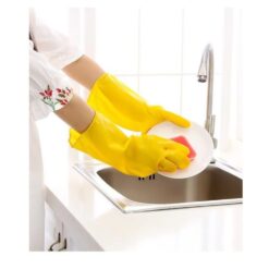 a yellow banana sitting on top of a refrigerator 